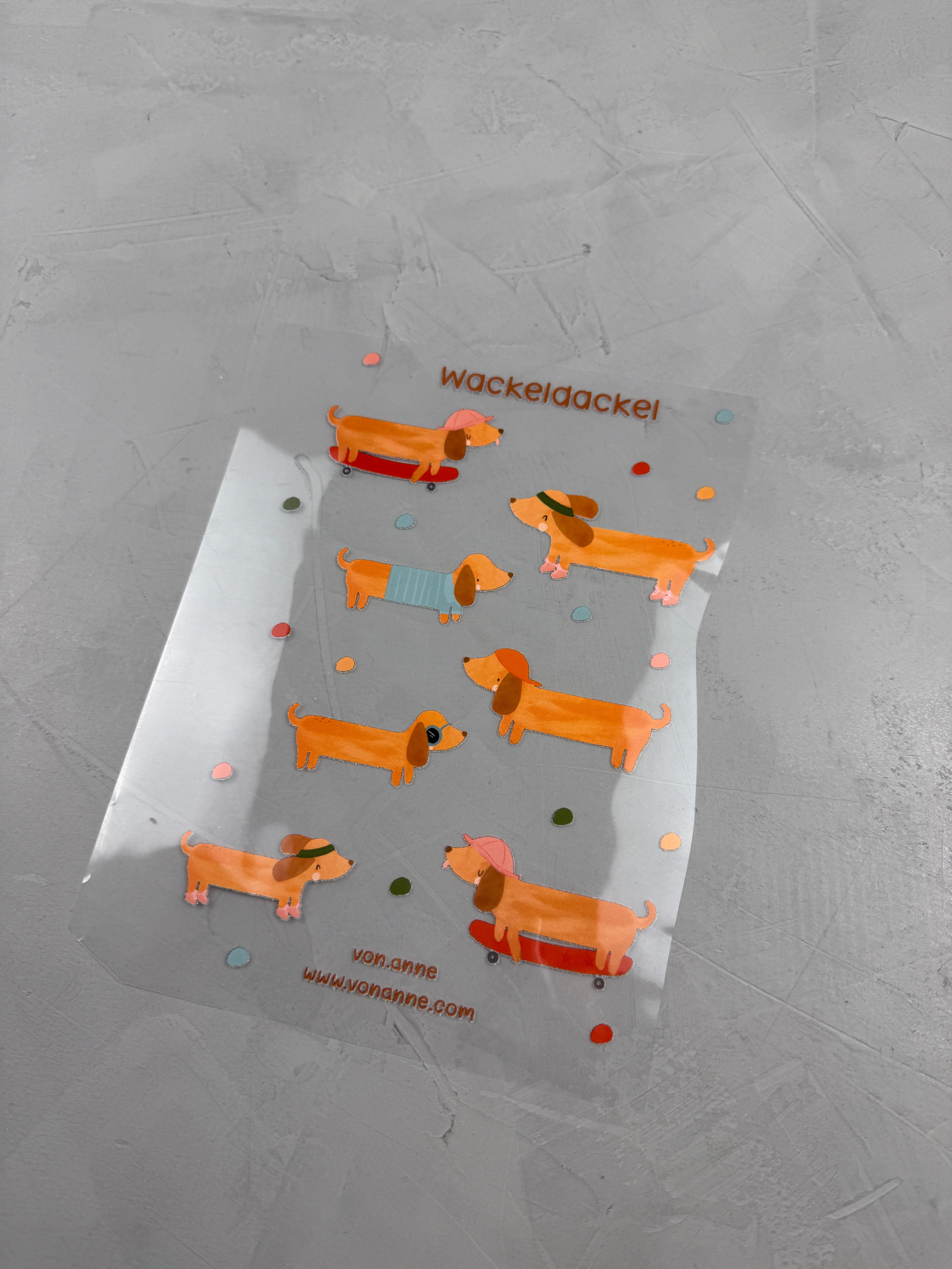 Bügelbildbogen - Wackeldackel