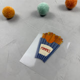 kleines Bügelbild -  Inmitten von Fritten