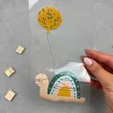 großes Bügelbild - Aus dem Häuschen/gelber Ballon